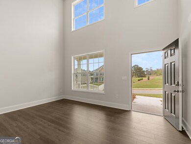 grayson 2-story foyer with large windows for natur
