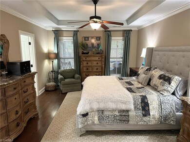 Primary Bedroom On Main Level with Trey Ceiling