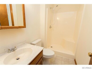 Master bath with shower.  New vinyl floor, new fau