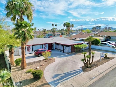 Single story home featuring concrete driveway