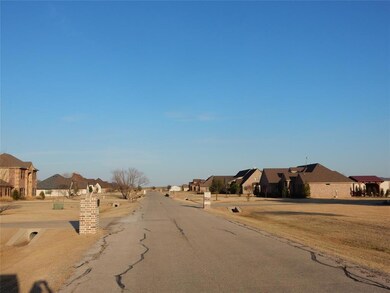 Street view with lot at the end of street