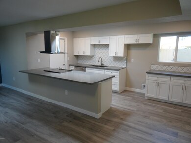 Kitchen is open to Family Room!