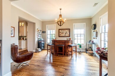 Formal dining room currently configured as a bar