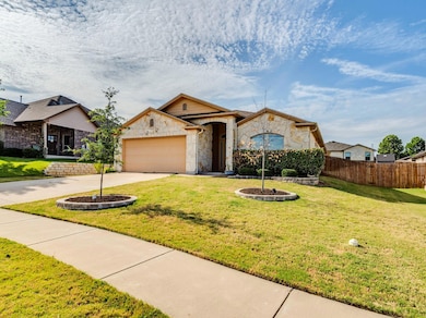 View of front of house with concrete driveway, st