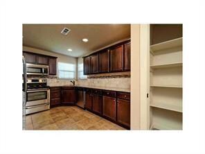 Kitchen/ Sample Pic/ Approx. Comp date 4/2016