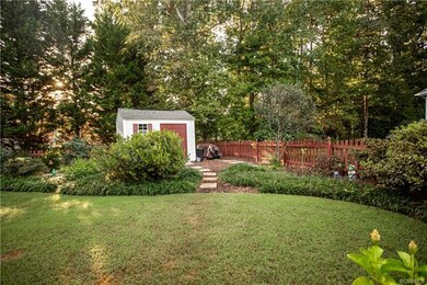 Landscaped yard with Shed and Fenced in Backyard!