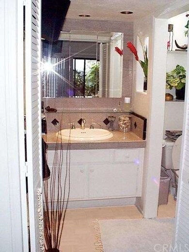 Upgraded master bath with granite counters and sky