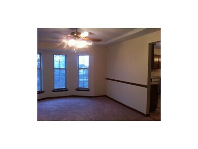 Formal dining room offers bay windows with sunny s