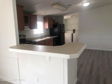 2537 Amberly Rd NE, Palm Bay, FL 32905 - photo 4