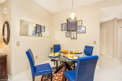 Dining area featuring light tile patterned floors