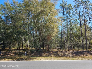 add lot next door to make .44 acres