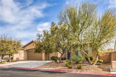 Obstructed view of property featuring stucco sidin