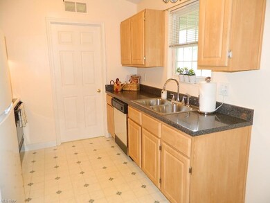 The Kitchen Overlooks the Common Area and the Pond