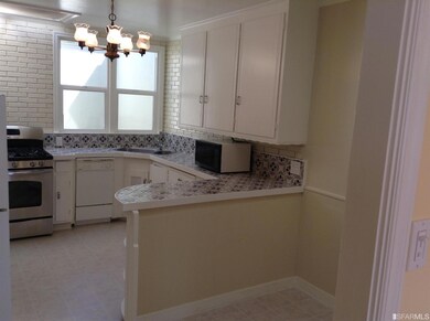 The eat-in kitchen is adjacent to the formal dinin