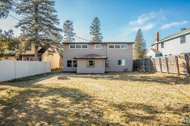 Good sized yard partially fenced Shed Firepit Face