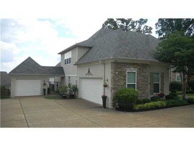 2 car attached garage and 1 car detached garage th