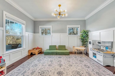 Dining room/den currently being used as playroom