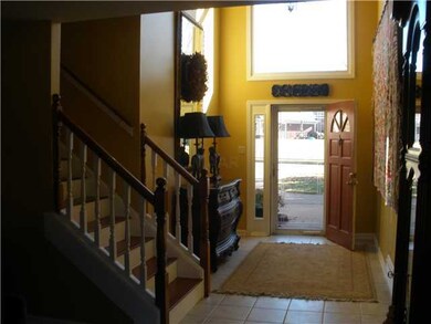 Beautiful 2 Story Entry with lots of light!  Warm 