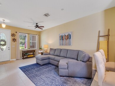 LIVING ROOM TO FOYER