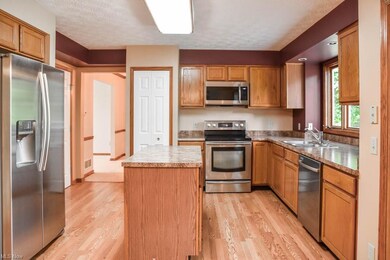 Updated kitchen has stainless steel appliances and