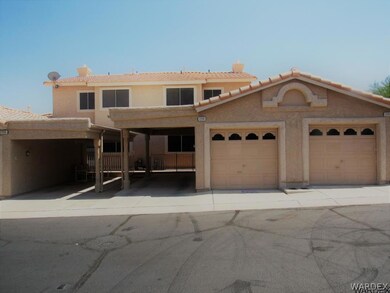 Garage and carport in back