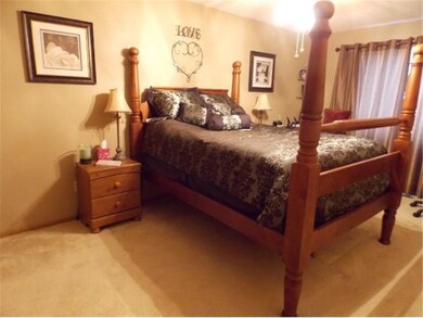 Large master bedroom is on of 2 main floor bedroom