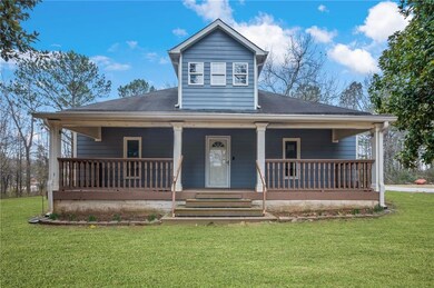 View of front of property featuring a porch, a fro