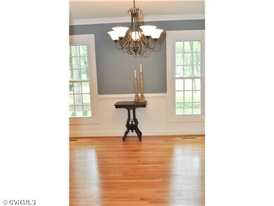 Dining Room - Hardwood Floors, Crown Molding, Chai