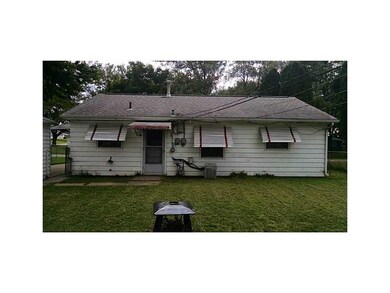 Exterior Back. Newer roof.