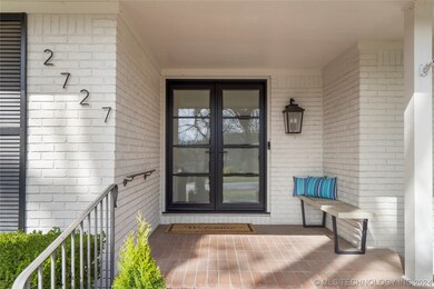 Covered front porch protects you from the elements