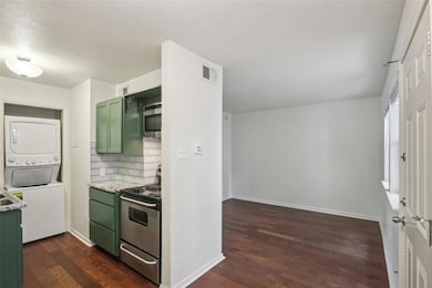 Kitchen featuring appliances with stainless steel