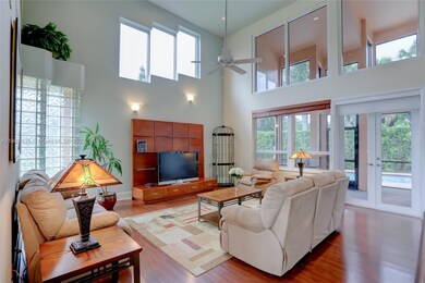 Great family room w/ views to the pool area