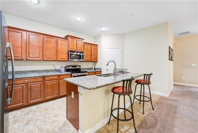 Big breakfast bar and notice the walk-in pantry in