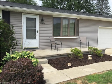 Welcome home to 8343 Rolling Hill Ave NW!