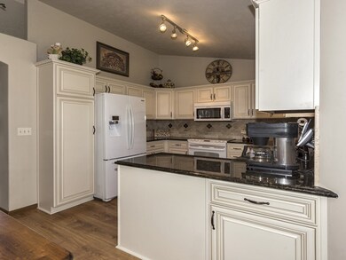 Beautifully Updated Kitchen with Granite Counter T