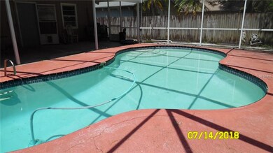 Screen enclosed pool and patio area