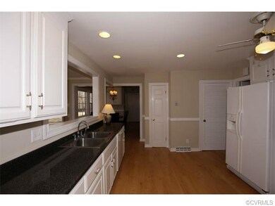 kitchen looking into breakfast area