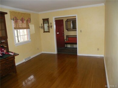 12x18 living room with beautiful hardwood floor.