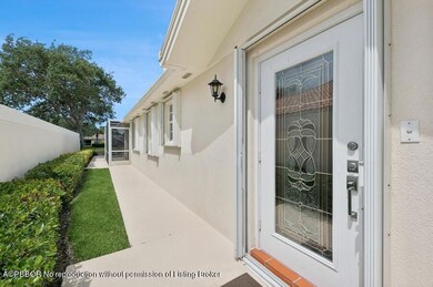 02_7791PineIslandWay_301_Entrance_Small