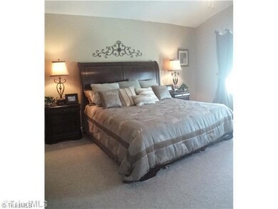 Master Bedroom. This is a decorated model of the Vivian floor plan and not the actual home. Decorative paint, home decor and furniture is not included in actual home. To demonstrate the floor plan only.