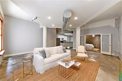 High ceilings and concrete floors
