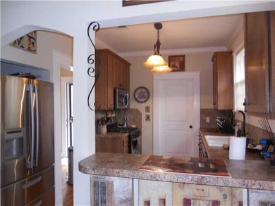 Gorgeous stainless appliances, tile floor and hone