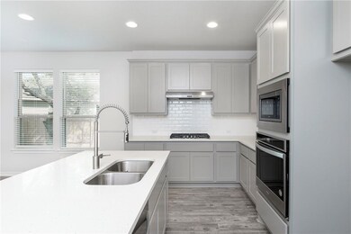 1613 Winding Stream Trail unit 75, Leander, TX 78641 - photo 2