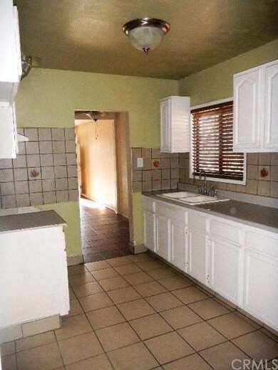 Kitchen from hallway to bedrooms