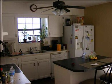 Ceiling fan in the kitchen with ample storage