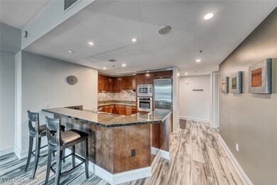 Kitchen featuring a kitchen breakfast bar, built i
