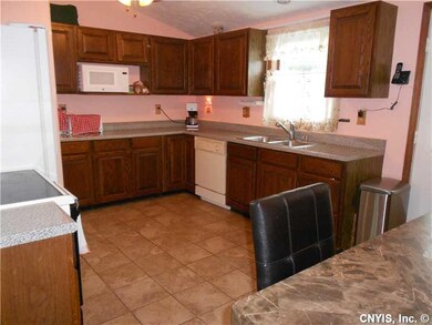 Kitchen. New countertops and ceramic tile flooring