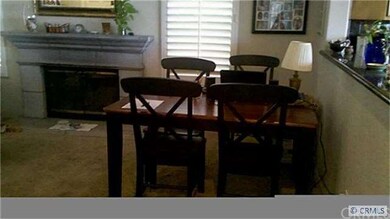 Fireplace in family room uses gas & wood