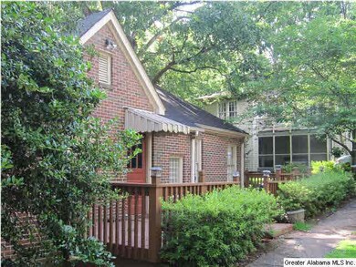 Main house side entrance with Carriage House in ba