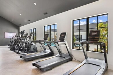 Exercise room with a wealth of natural light and l